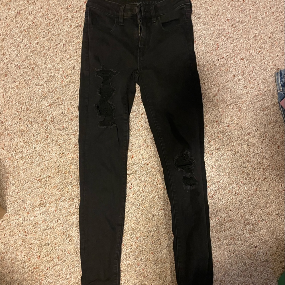 AE distressed black skinny jeans